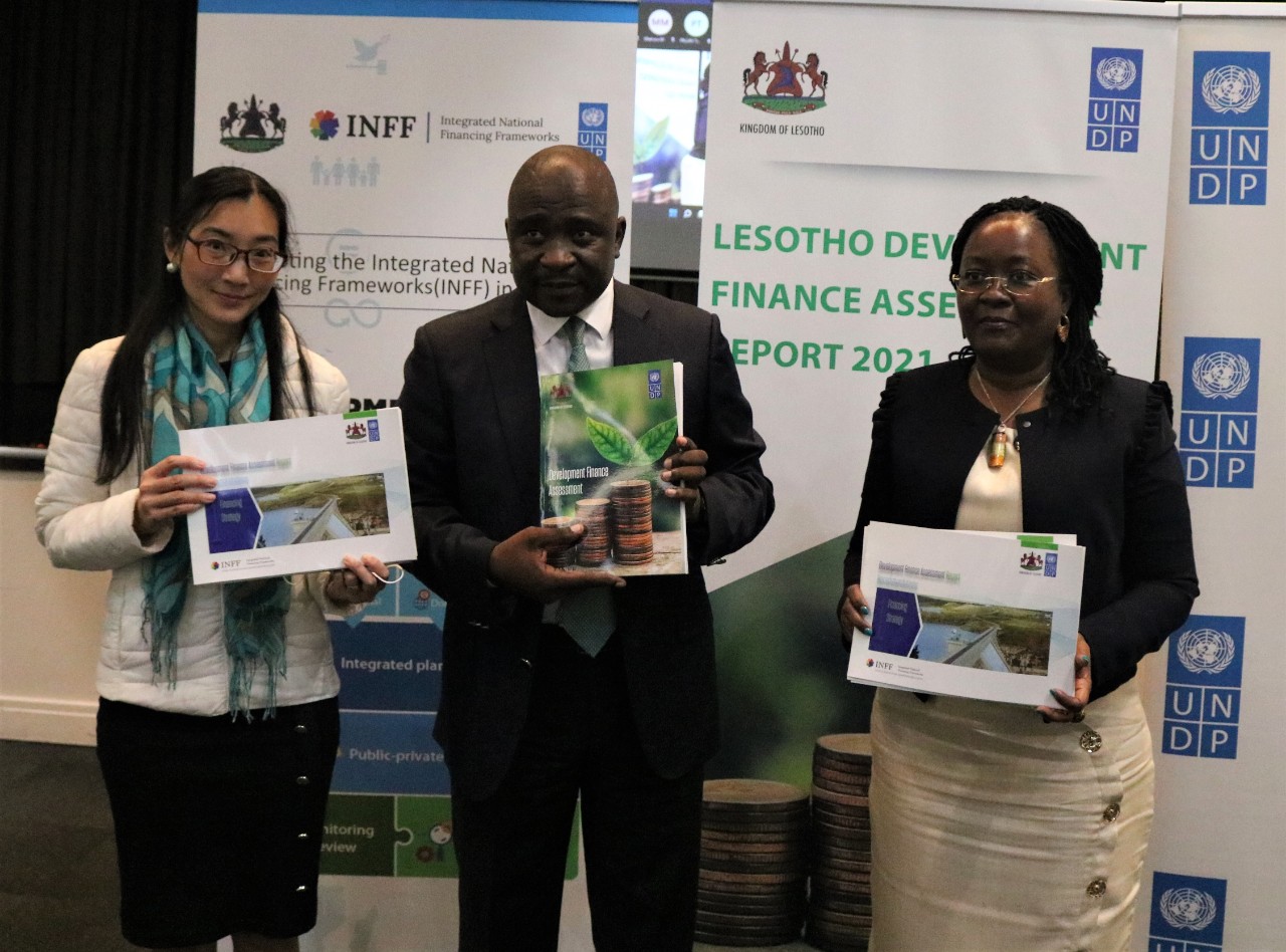 From Left: Ms. Eriko Nishimura, IOM Country Representative, Hon. Selibe Mochoboroane, Ministry of Development Planning Minister , Ms. Betty Wabunoha, UNDP Resident Representative